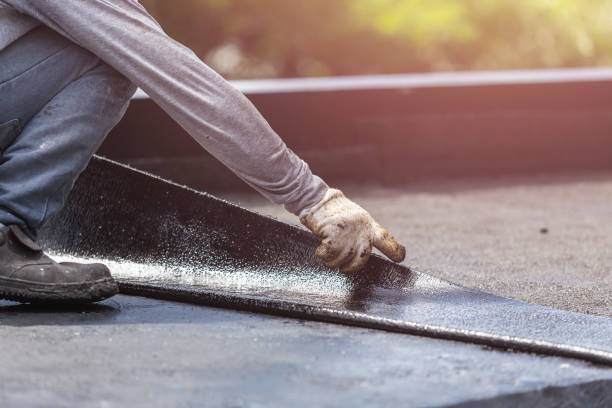 Professional Waterproofing technician working in Morrisonville, IL
